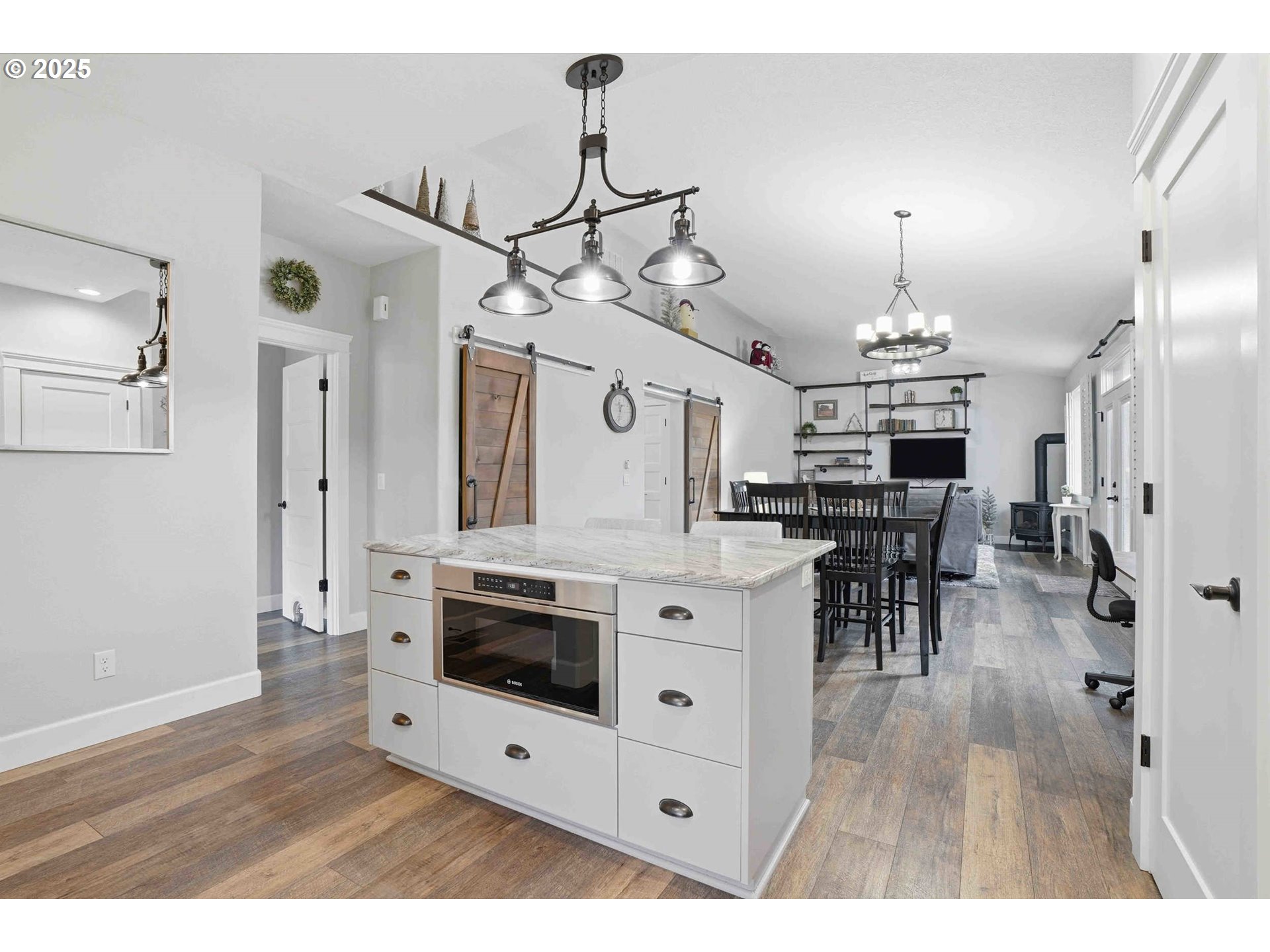 112 Summit View Avenue Southeast Salem, OR 97306 - Photo 12 of 47 a view of a livingroom with furniture wooden floor a chandelier