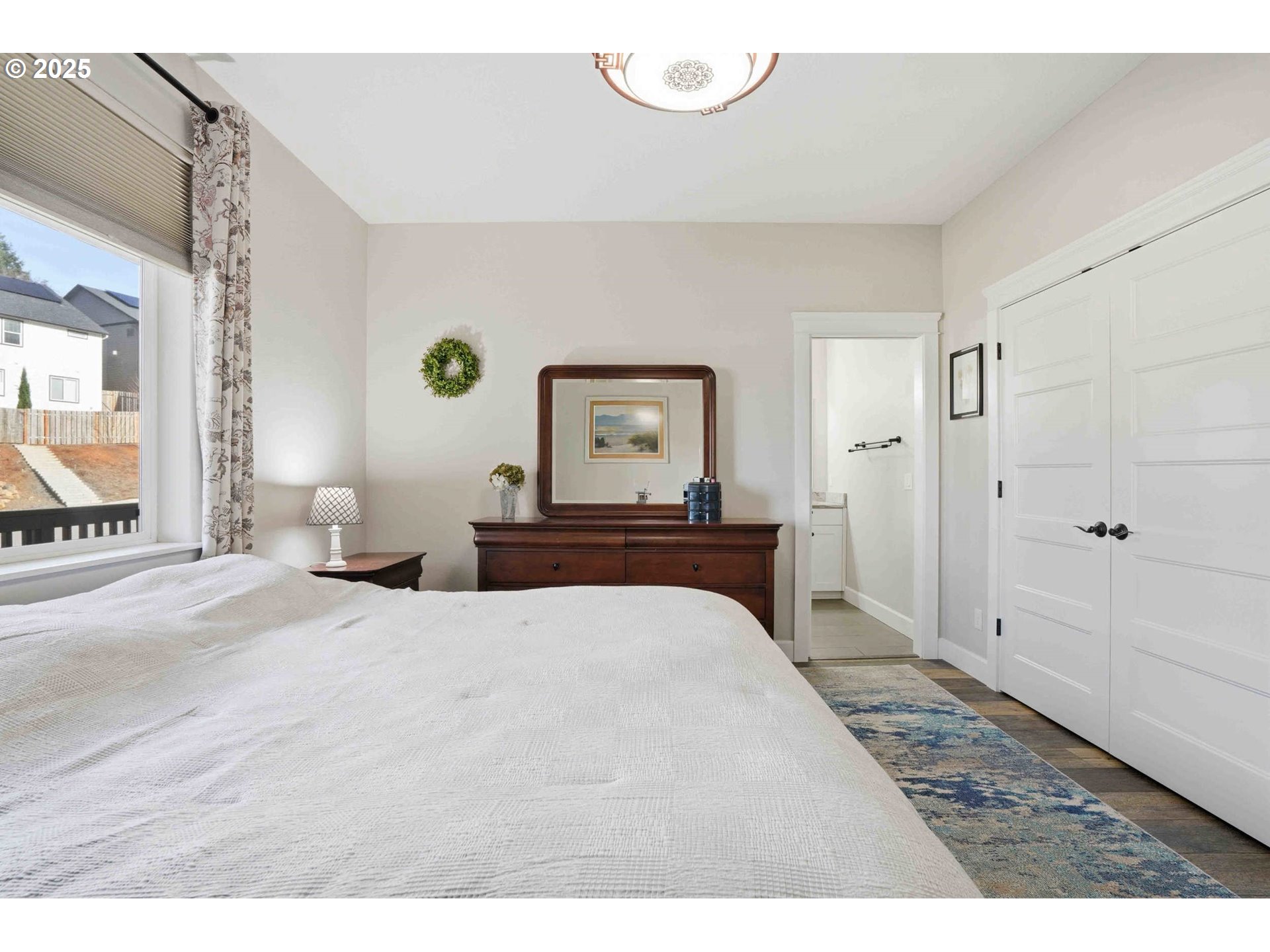 112 Summit View Avenue Southeast Salem, OR 97306 - Photo 24 of 47 a bedroom with a bed and a large mirror