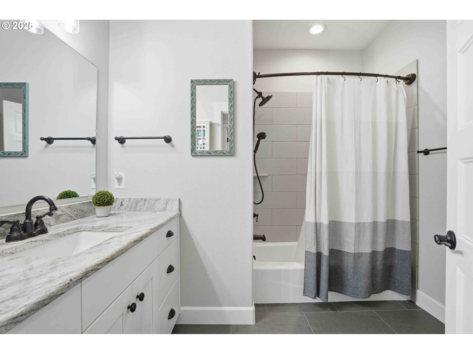 112 Summit View Avenue Southeast Salem, OR 97306 - Photo 26 of 47 a bathroom with a double vanity sink a mirror a shower and vanity