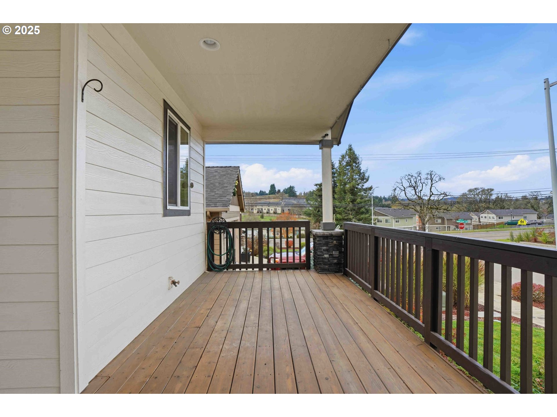 112 Summit View Avenue Southeast Salem, OR 97306 - Photo 6 of 47 a balcony with wooden floor