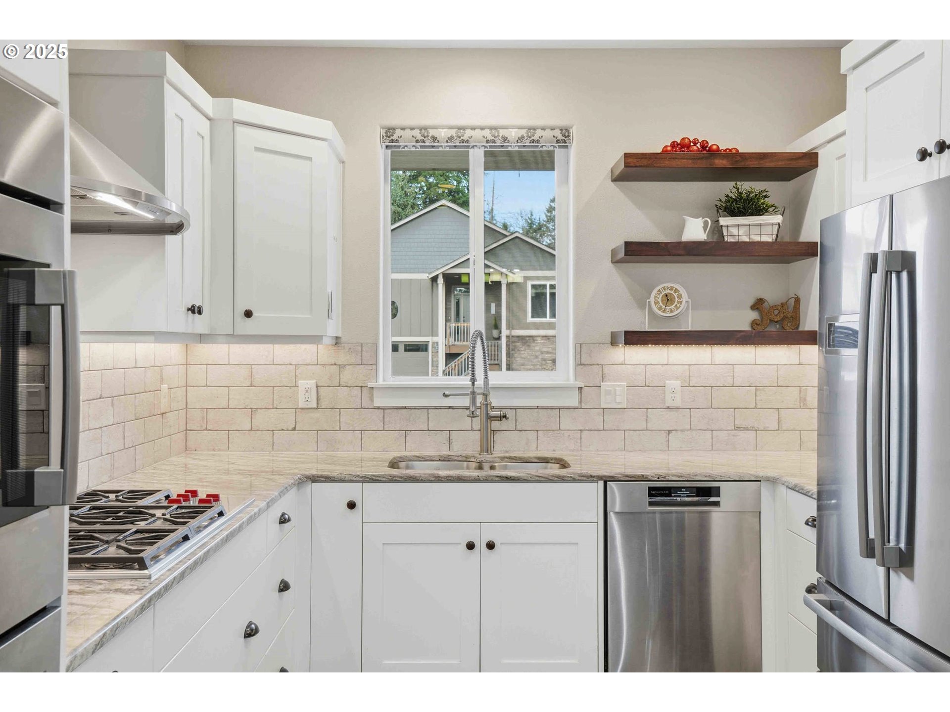 112 Summit View Avenue Southeast Salem, OR 97306 - Photo 9 of 47 a kitchen with cabinets and window