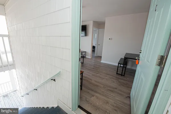 a bedroom with a bed and a walk in closet