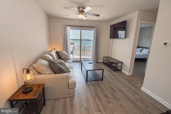 an empty room with wooden floor