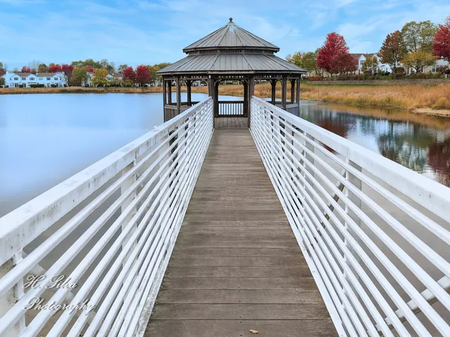a view of wooden floor with a lake view