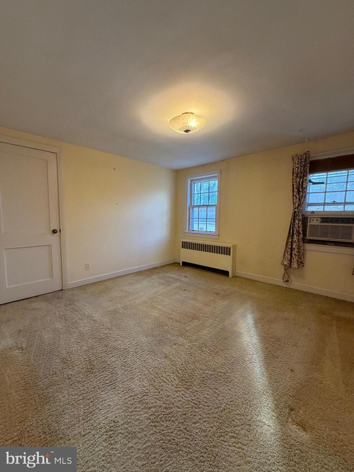 7203 Benedict Avenue Benedict, MD 20612 - Photo 14 of 23 a view of an empty room with a window