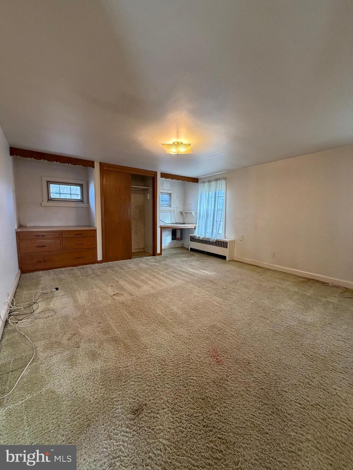 7203 Benedict Avenue Benedict, MD 20612 - Photo 15 of 23 a view of an empty room with a window