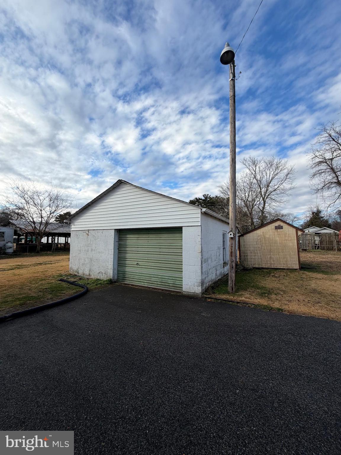 7203 Benedict Avenue Benedict, MD 20612 - Photo 20 of 23 a view of a house with a yard