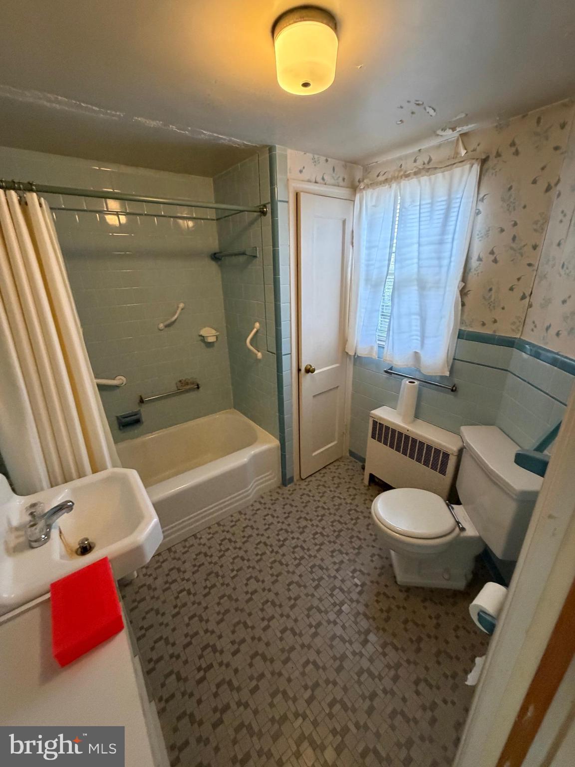 7203 Benedict Avenue Benedict, MD 20612 - Photo 23 of 23 a bathroom with a sink and a mirror