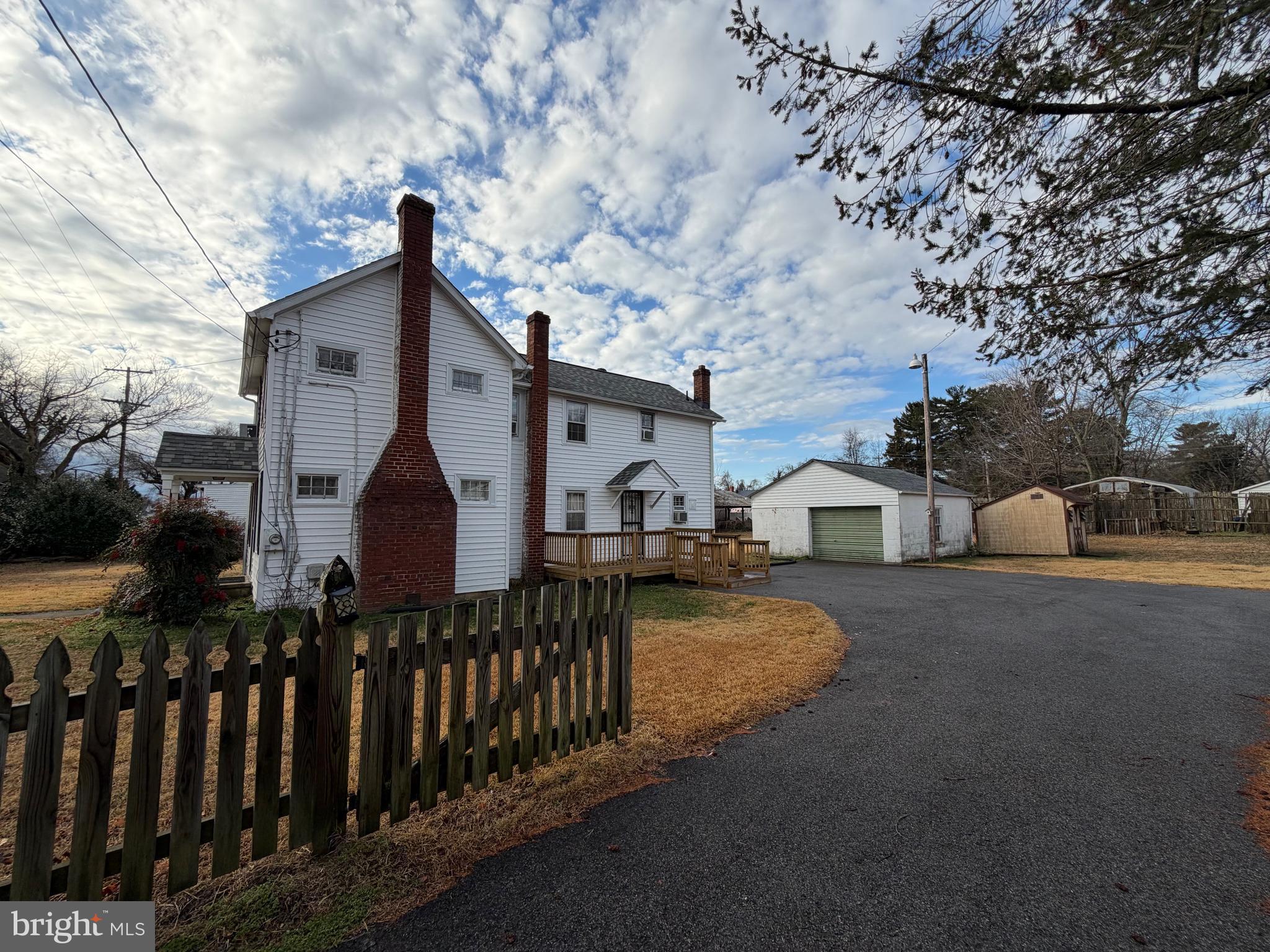 7203 Benedict Avenue Benedict, MD 20612 - Photo 5 of 23 a front view of a house with yard