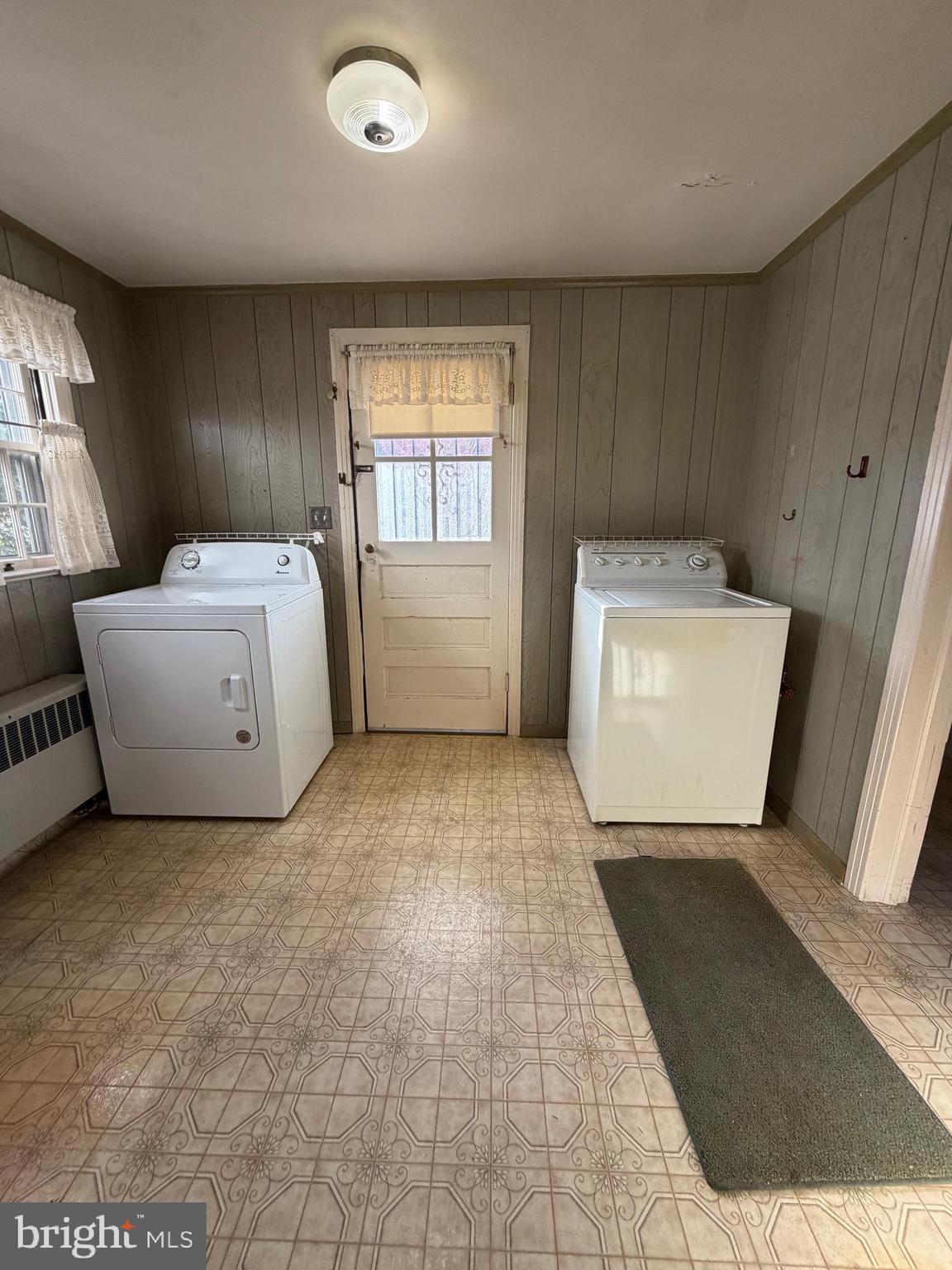 7203 Benedict Avenue Benedict, MD 20612 - Photo 9 of 23 a room with a washer and dryer