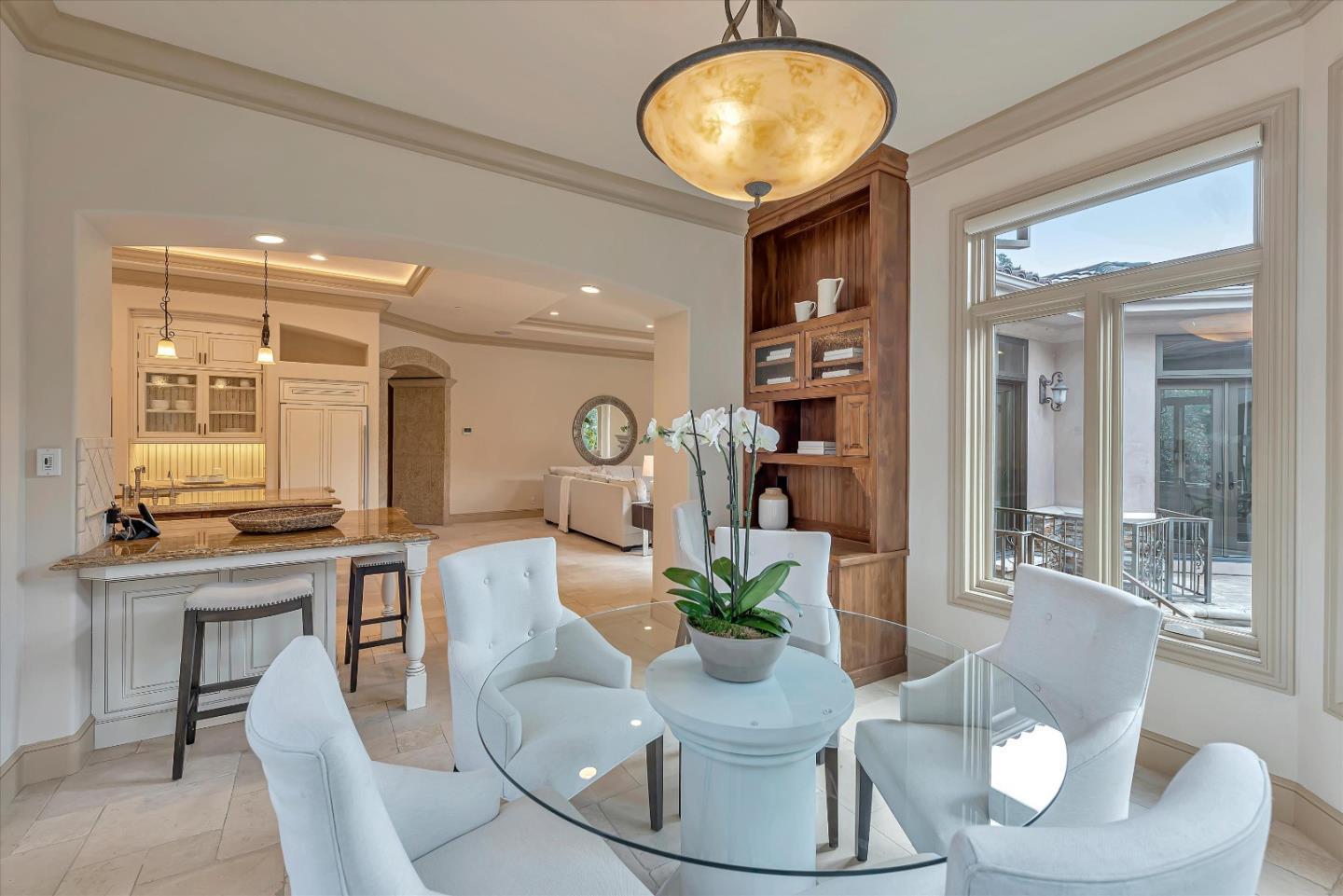 28025 Natoma Road Los Altos Hills, CA 94022 - Photo 24 of 44 a view of a dining room with furniture