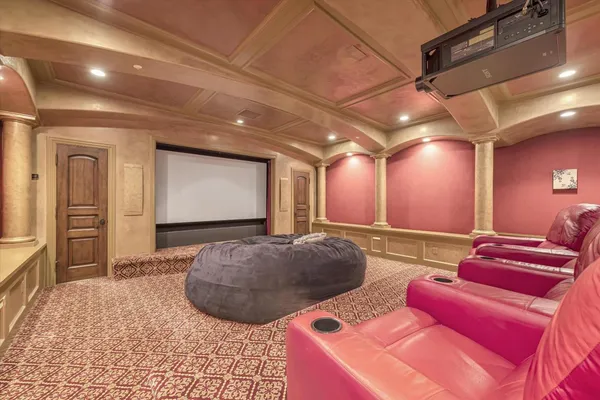 a view of a dining room with furniture and windows