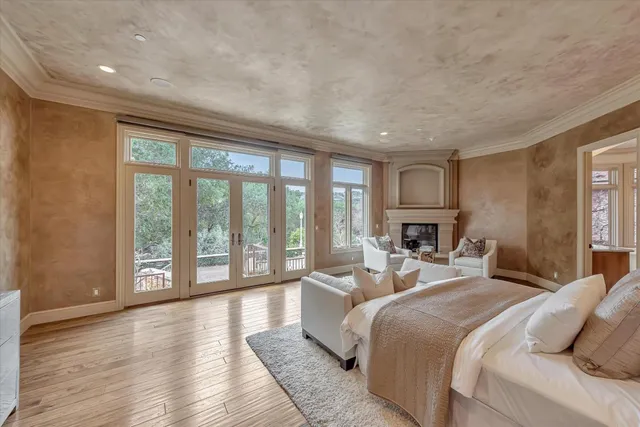 a bed room with furniture and wooden floor