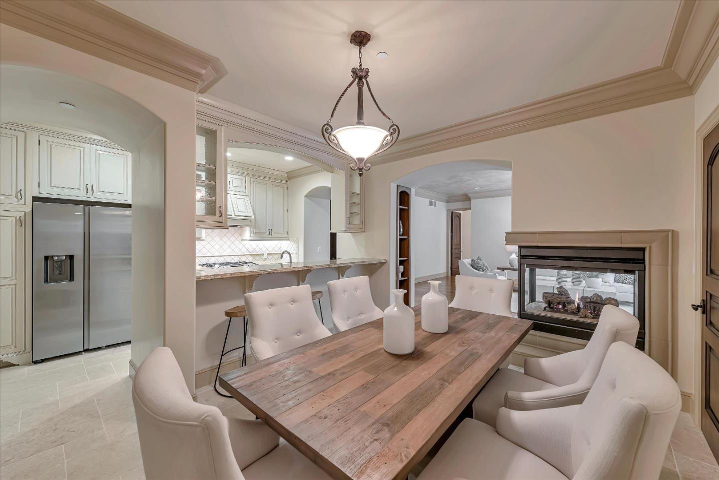 28025 Natoma Road Los Altos Hills, CA 94022 - Photo 39 of 44 a living room with furniture and a chandelier