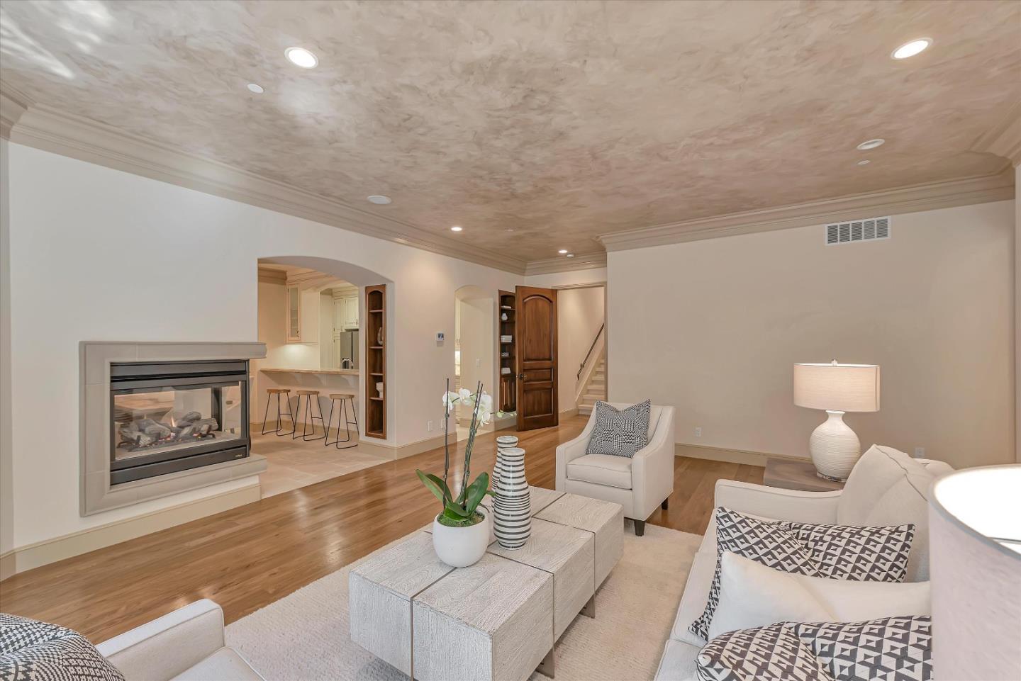 28025 Natoma Road Los Altos Hills, CA 94022 - Photo 40 of 44 a living room with furniture and a wooden floor