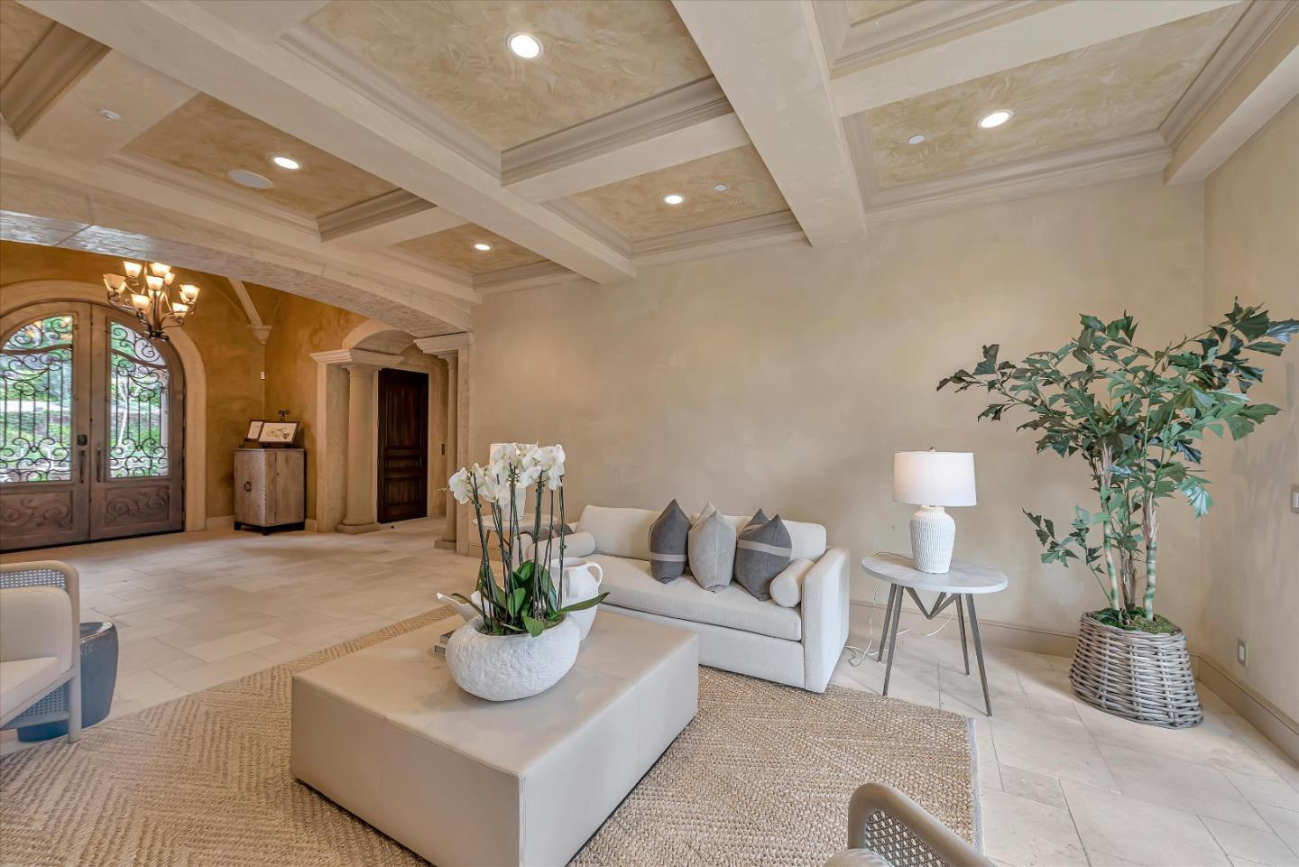 28025 Natoma Road Los Altos Hills, CA 94022 - Photo 42 of 44 a living room with furniture and a potted plant