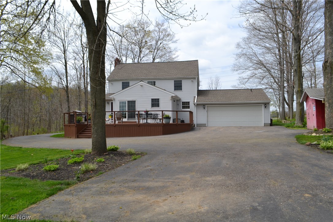 3995 Ridge Road Medina, OH 44256 - Photo 33 of 35 Invisible fence covers at least 1 acre of this home front and back yards. Huge parking pad for a camper/trailer /food truck, extra cars or guest parking.
