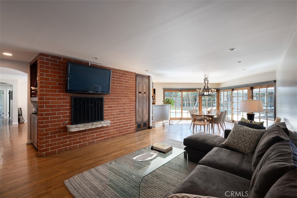 1222 Sharon Road Santa Ana, CA 92706 - Photo 11 of 34 a living room with furniture and a flat screen tv
