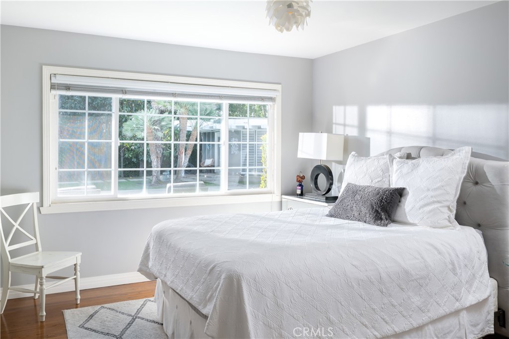 1222 Sharon Road Santa Ana, CA 92706 - Photo 14 of 34 a bedroom with a bed and a large window