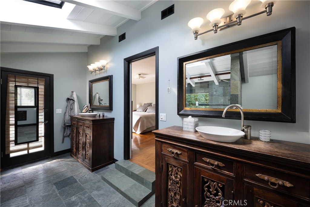 1222 Sharon Road Santa Ana, CA 92706 - Photo 18 of 34 a kitchen with a sink appliances and a large window
