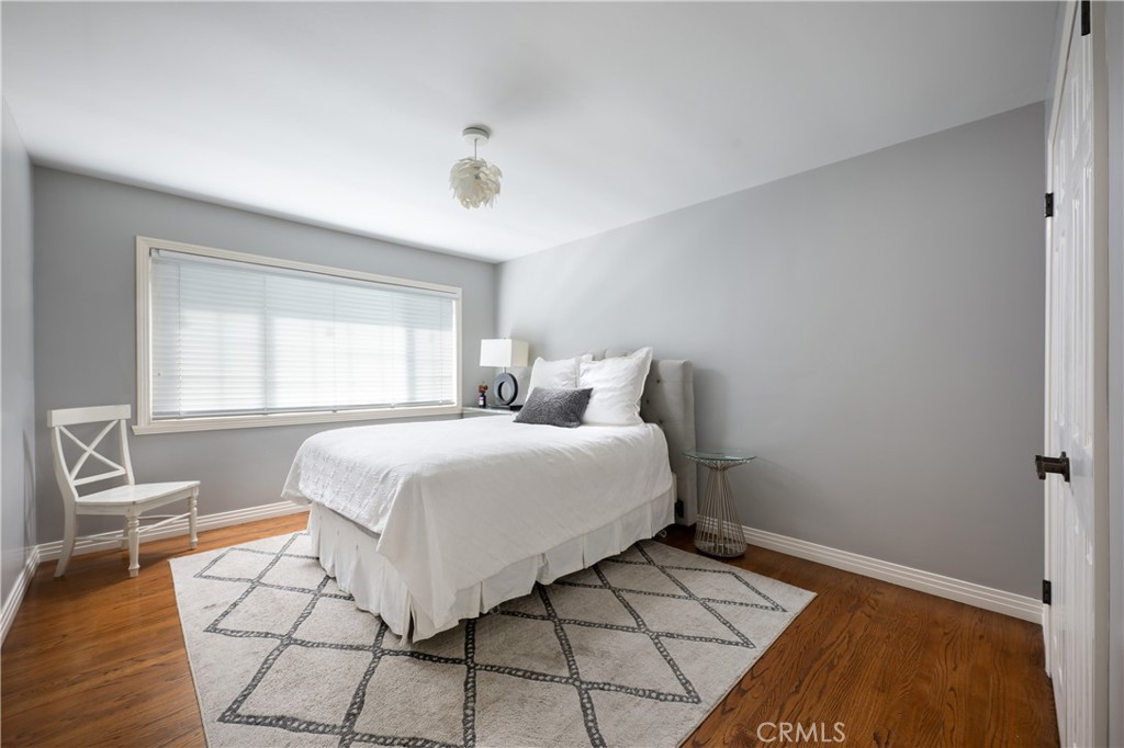 1222 Sharon Road Santa Ana, CA 92706 - Photo 20 of 34 a bedroom with a bed and a window
