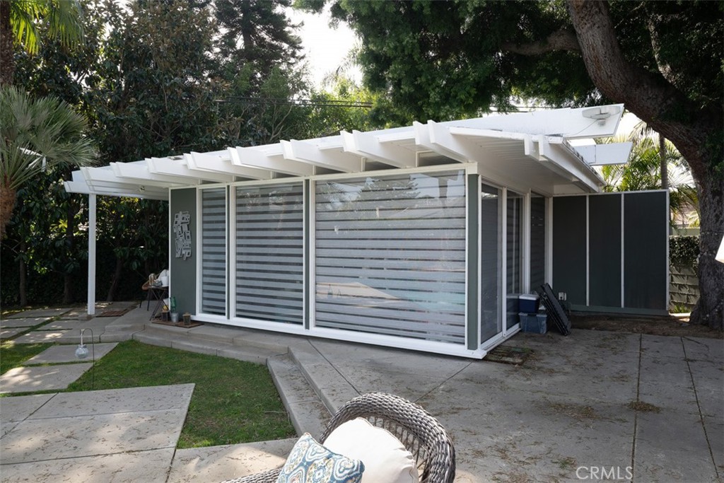1222 Sharon Road Santa Ana, CA 92706 - Photo 28 of 34 a view of a white house with a sink and yard