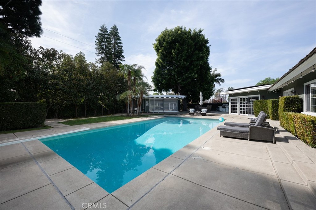 1222 Sharon Road Santa Ana, CA 92706 - Photo 33 of 34 a view of a house with swimming pool and sitting area