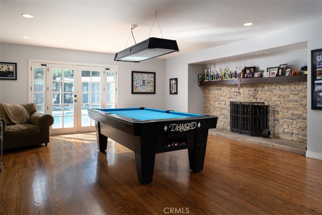 1222 Sharon Road Santa Ana, CA 92706 - Photo 5 of 34 a living room with furniture and a fireplace