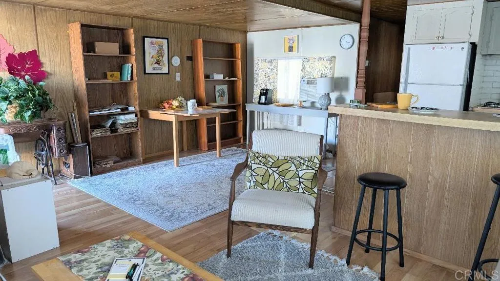 9459 Mission Gorge Road, Unit 68 Santee, CA 92071 - Photo 6 of 13 a living room with furniture and a potted plant