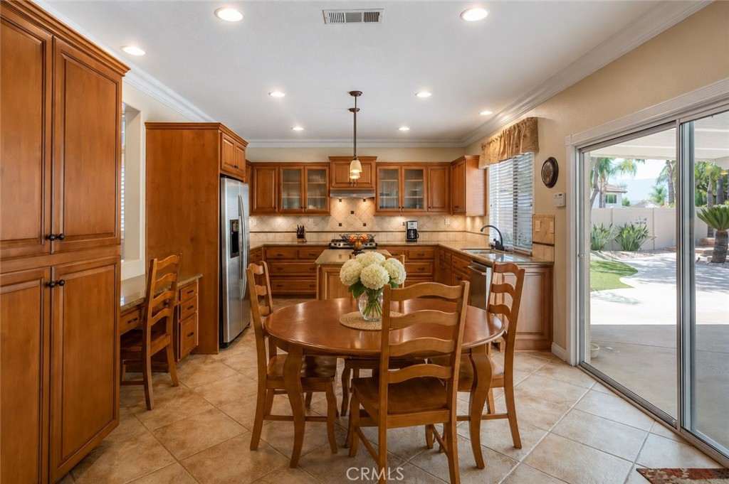 33351 Nicholas Common Temecula, CA 92592 - Photo 10 of 42 a view of a dining room with furniture window and outside view