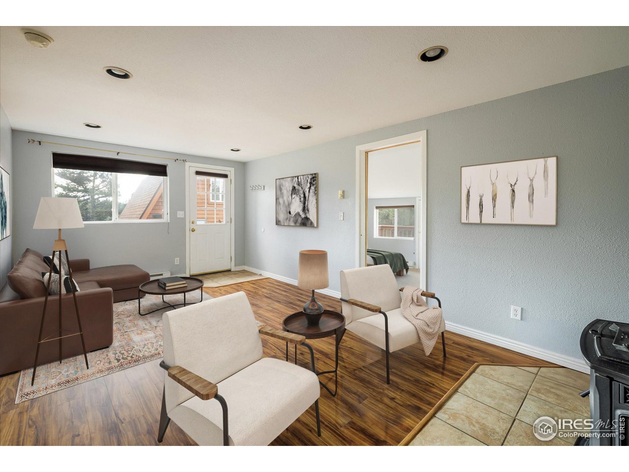15 Hardscrabble Road Golden, CO 80403 - Photo 11 of 50 a living room with furniture and wooden floor