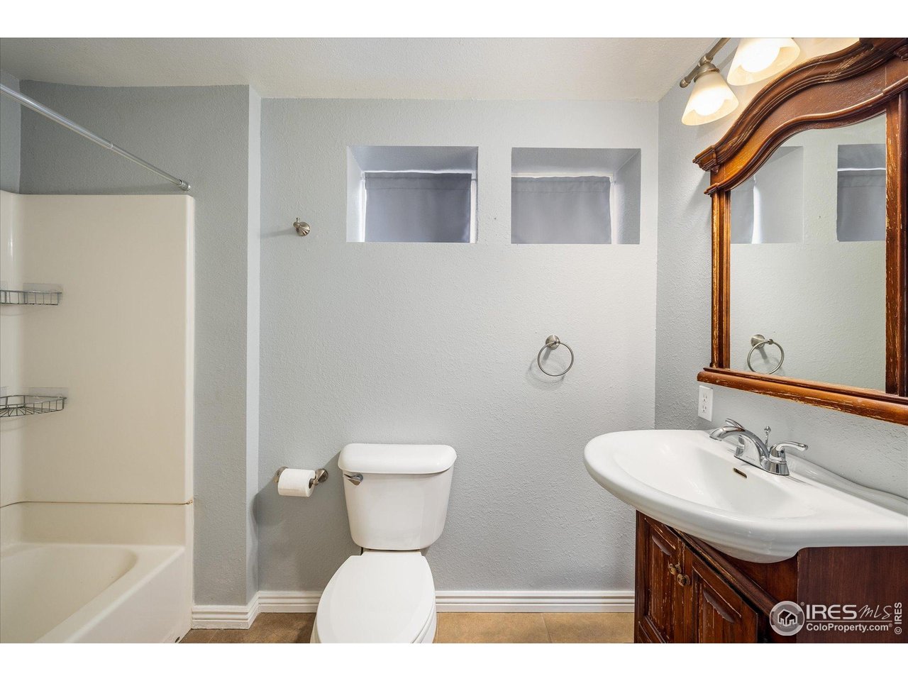 15 Hardscrabble Road Golden, CO 80403 - Photo 16 of 50 a bathroom with a sink toilet and shower