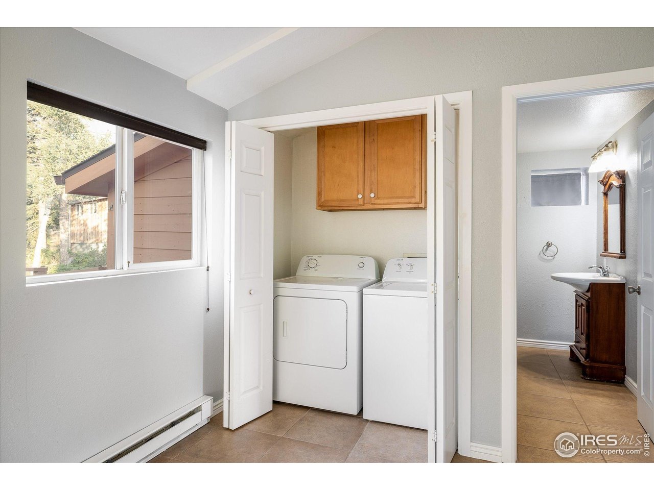 15 Hardscrabble Road Golden, CO 80403 - Photo 17 of 50 a bathroom with a sink and a window