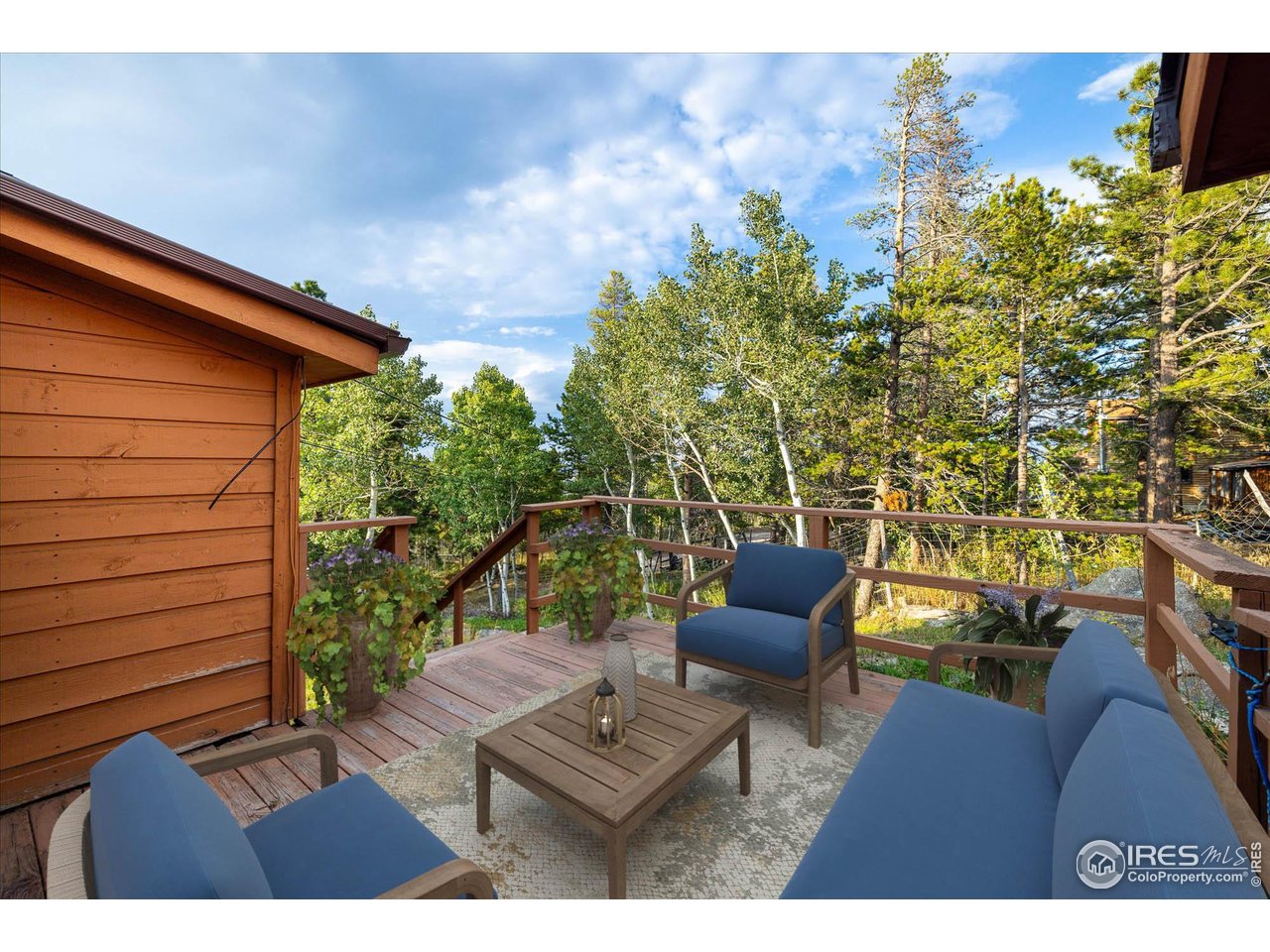 15 Hardscrabble Road Golden, CO 80403 - Photo 18 of 50 a view of a chairs and table in the patio
