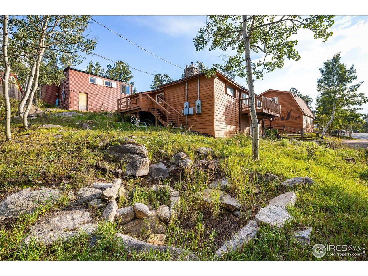 15 Hardscrabble Road Golden, CO 80403 - Photo 29 of 50 a front view of house with yard and trees
