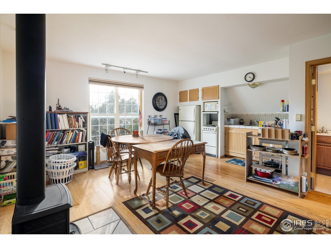 15 Hardscrabble Road Golden, CO 80403 - Photo 33 of 50 a living room with furniture a rug and a large window