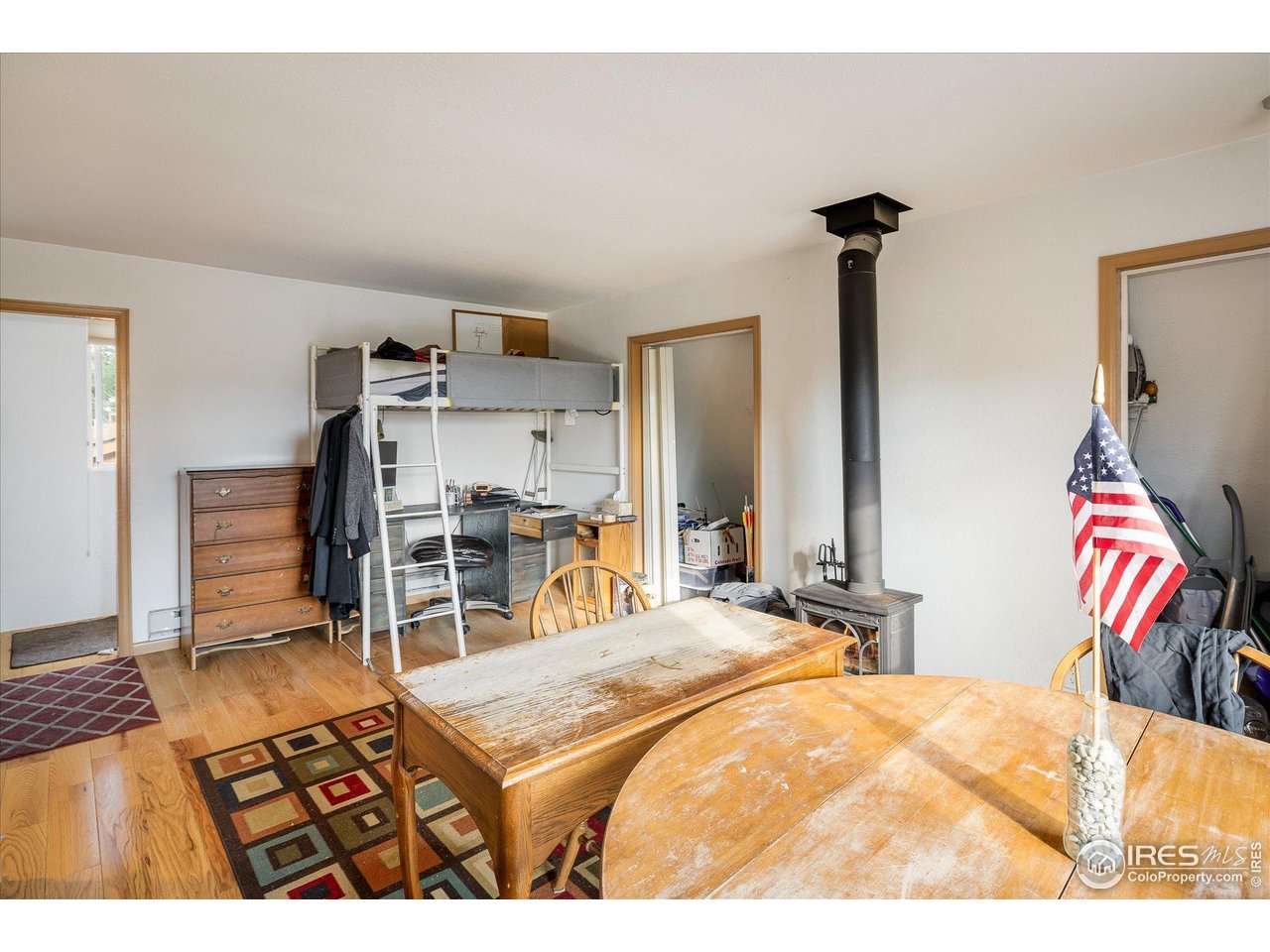 15 Hardscrabble Road Golden, CO 80403 - Photo 36 of 50 a bedroom with a bed and a tv in it