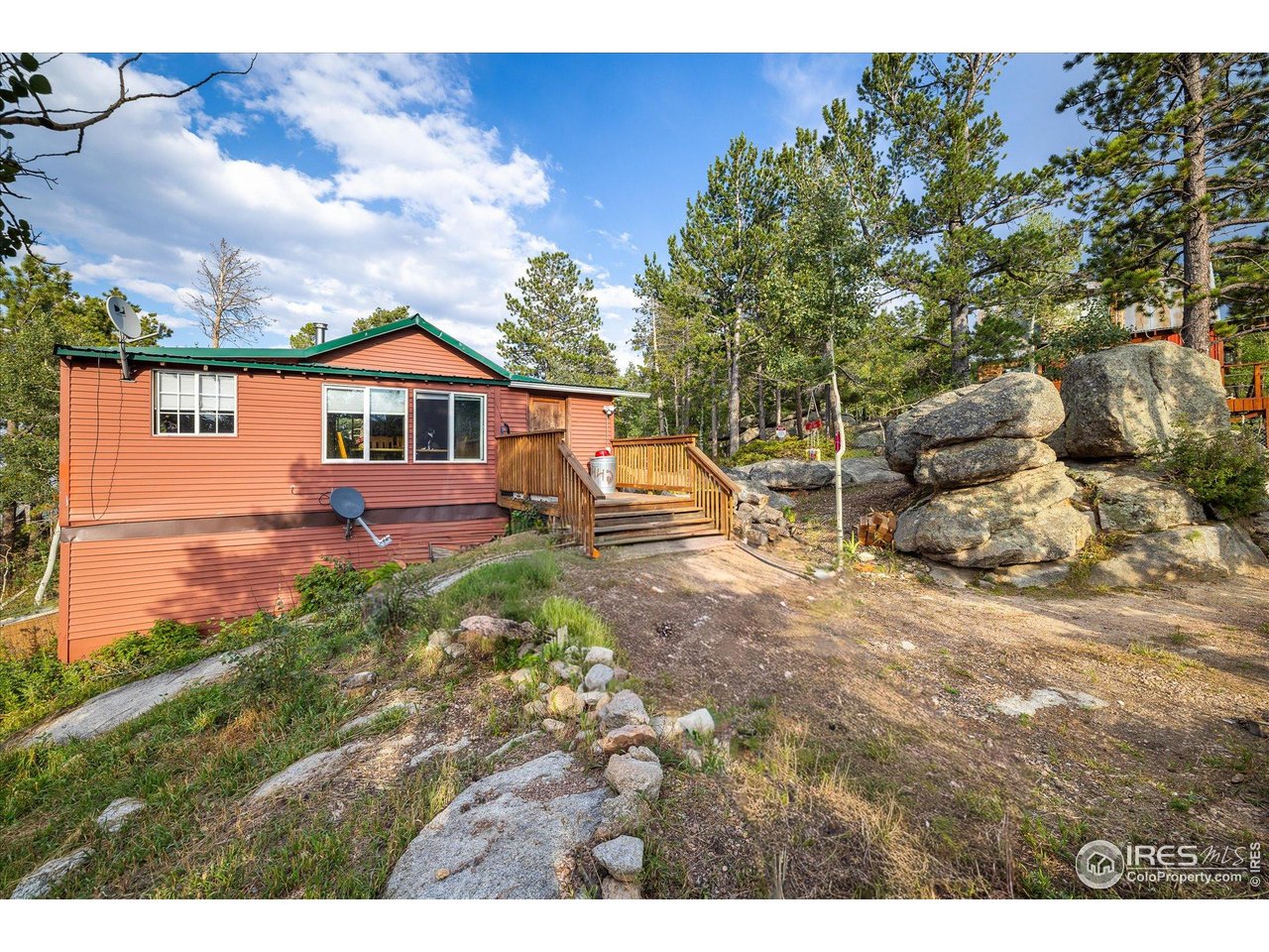 15 Hardscrabble Road Golden, CO 80403 - Photo 42 of 50 a view of a house with a yard