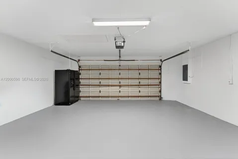 a view of an empty room with shelves