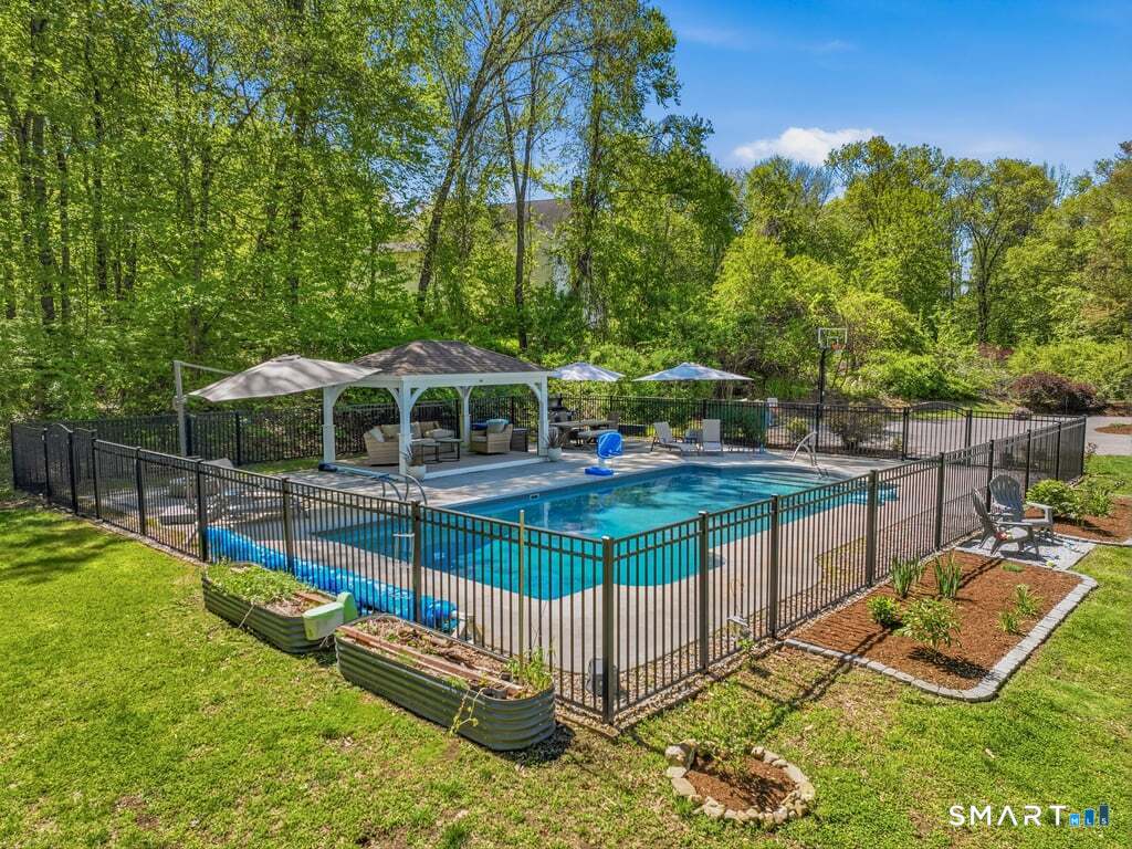 15 Fox Ridge Lane Hebron, CT 06248 - Photo 5 of 40 In ground pool with fence, gas line to fire pit and grill, gazebo with trex deck all done in 2020!