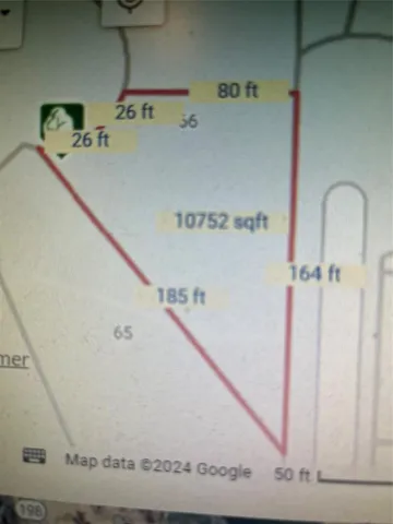 a utility room with a ceiling fan