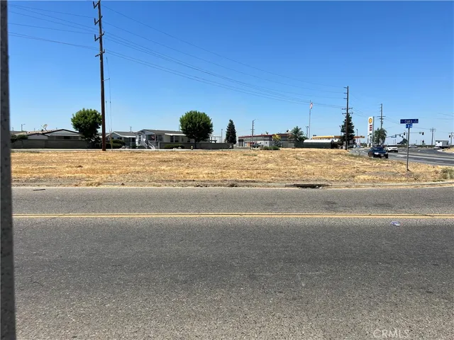 a view of a water with a building in the background