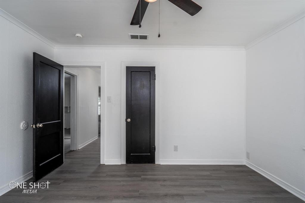 1909 Highland Avenue Abilene, TX 79605 - Photo 7 of 23 a view of empty room with wooden floor