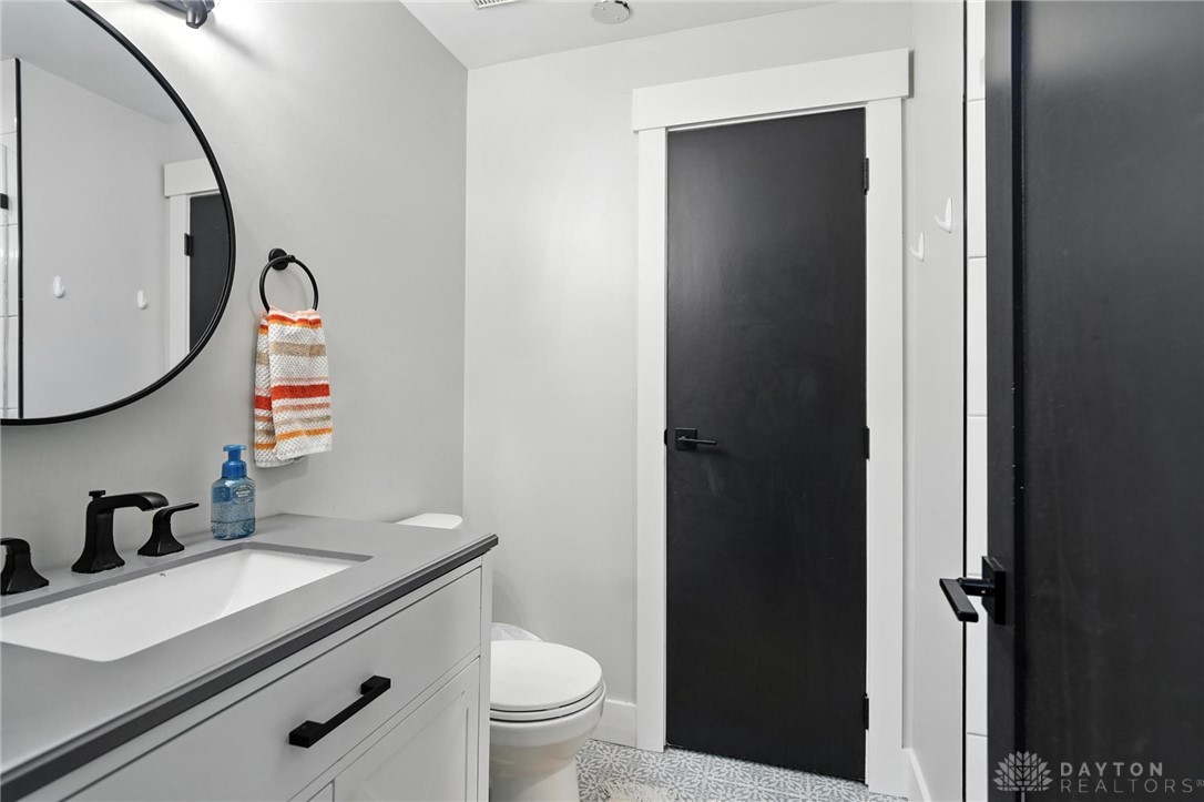 9258 Clyo Road Dayton, OH 45458 - Photo 38 of 68 main level bathroom with walk in shower.