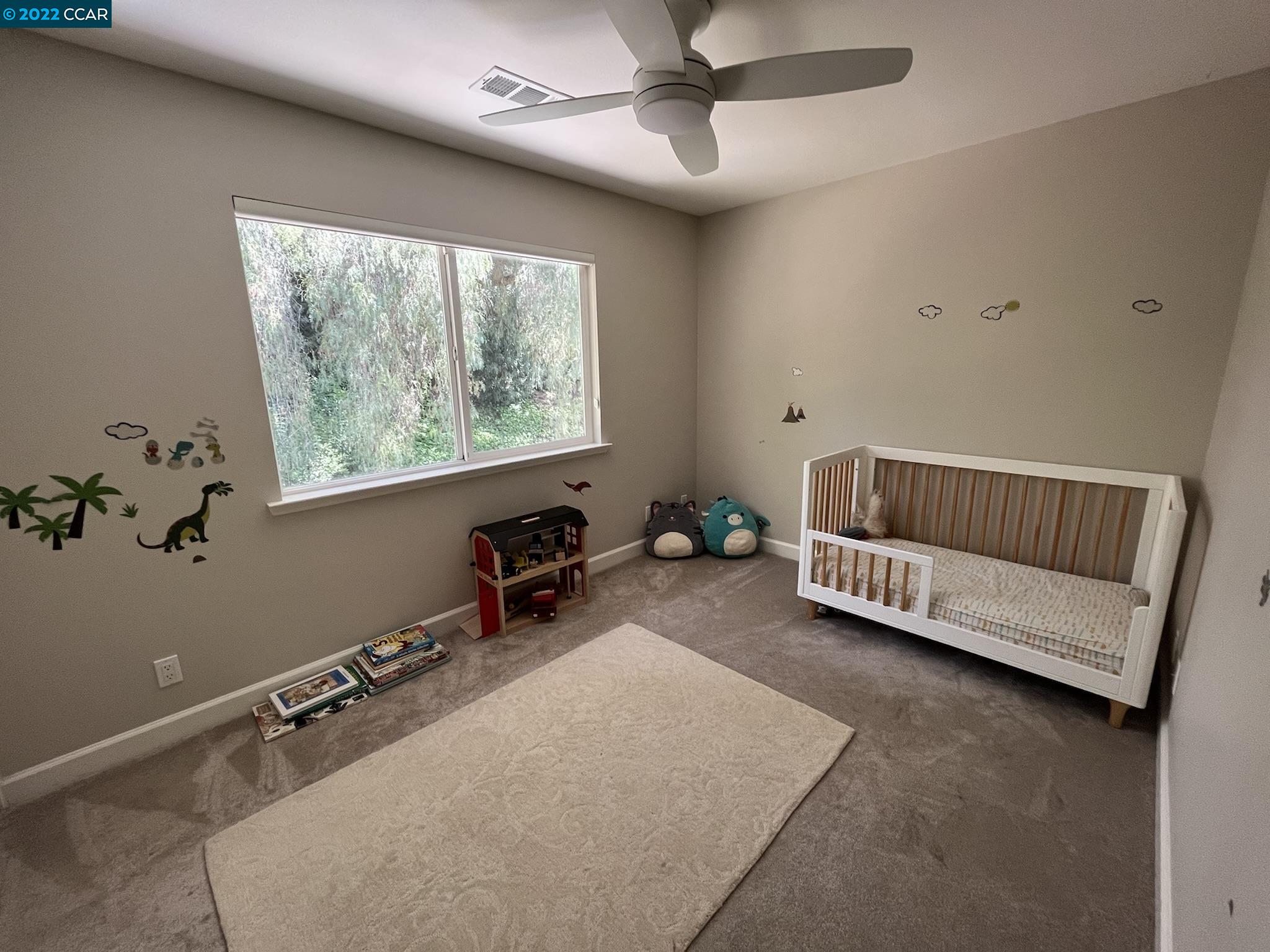 4387 Fallbrook Road Concord, CA 94521 - Photo 16 of 26 a living room with furniture and a window