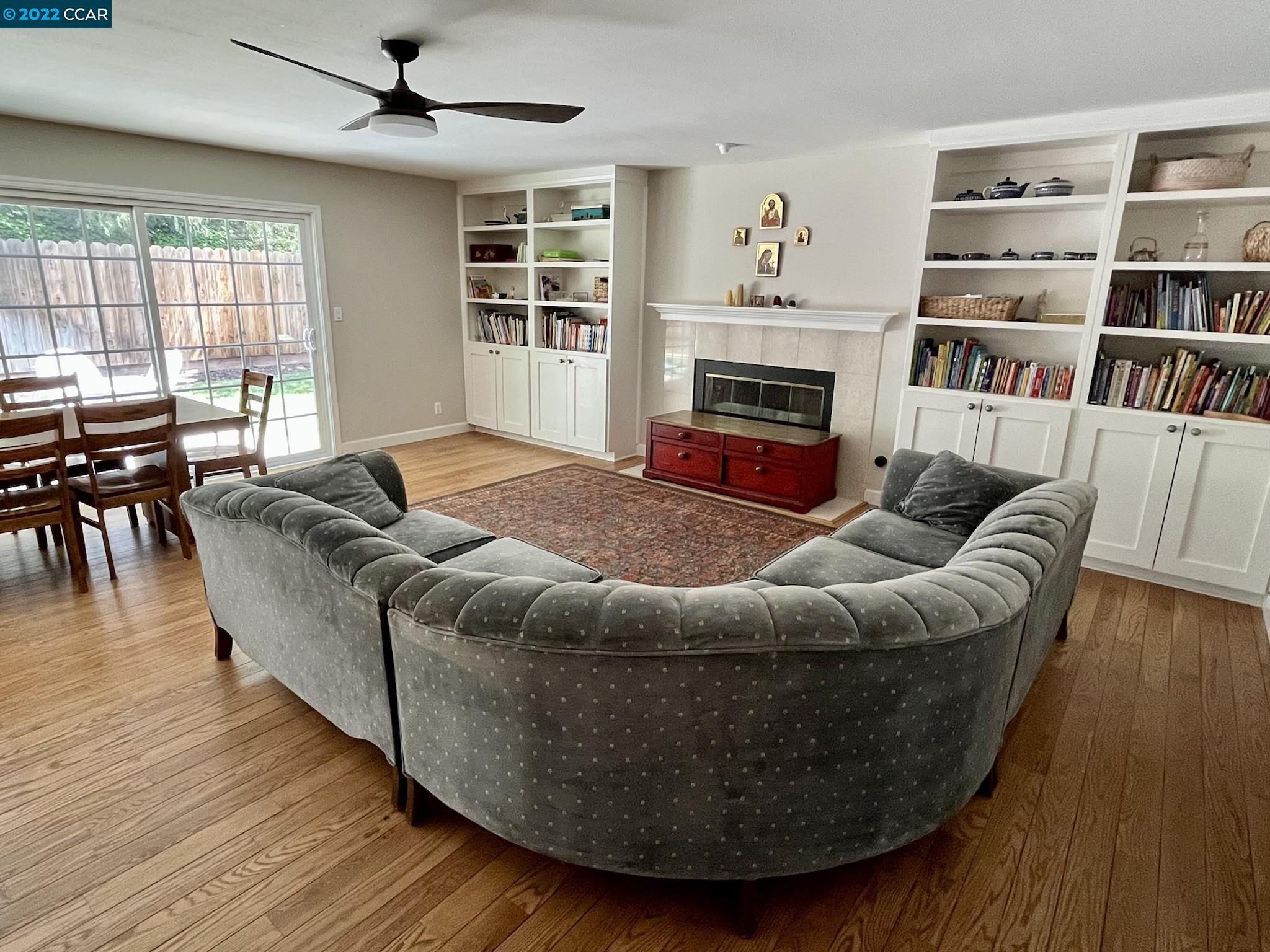 4387 Fallbrook Road Concord, CA 94521 - Photo 2 of 26 a living room with furniture and a fireplace