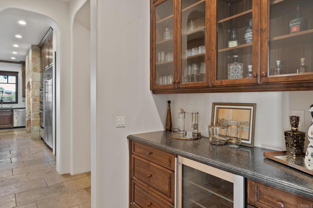 2908 Gate 5 Place Chula Vista, CA 91914 - Photo 11 of 63 a kitchen with stainless steel appliances granite countertop a sink and cabinets