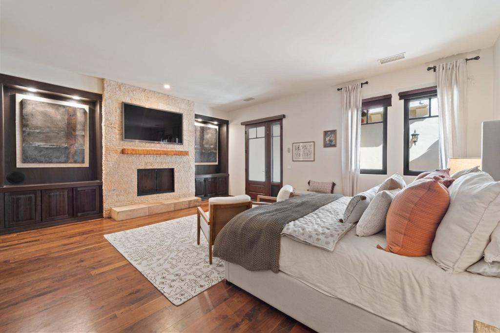 2908 Gate 5 Place Chula Vista, CA 91914 - Photo 14 of 63 a spacious bedroom with a bed and a flat screen television