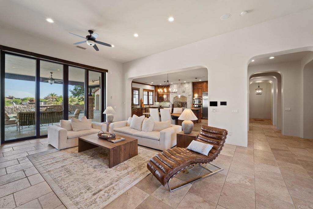 2908 Gate 5 Place Chula Vista, CA 91914 - Photo 19 of 63 a living room with furniture large window and a table
