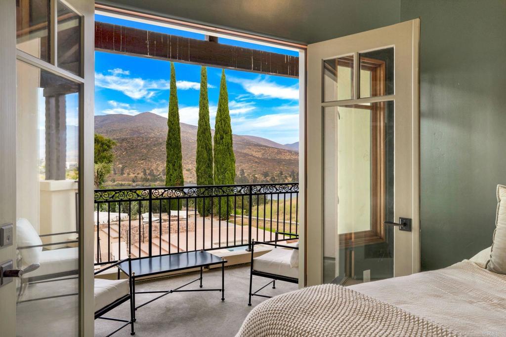 2908 Gate 5 Place Chula Vista, CA 91914 - Photo 39 of 63 a bedroom with a bed and a window